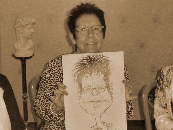Gast mit ihrer Karikatur