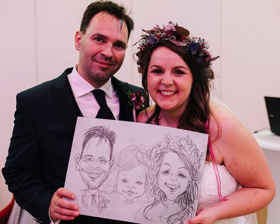 Brautpaar mit seiner Karikatur, Hochzeit